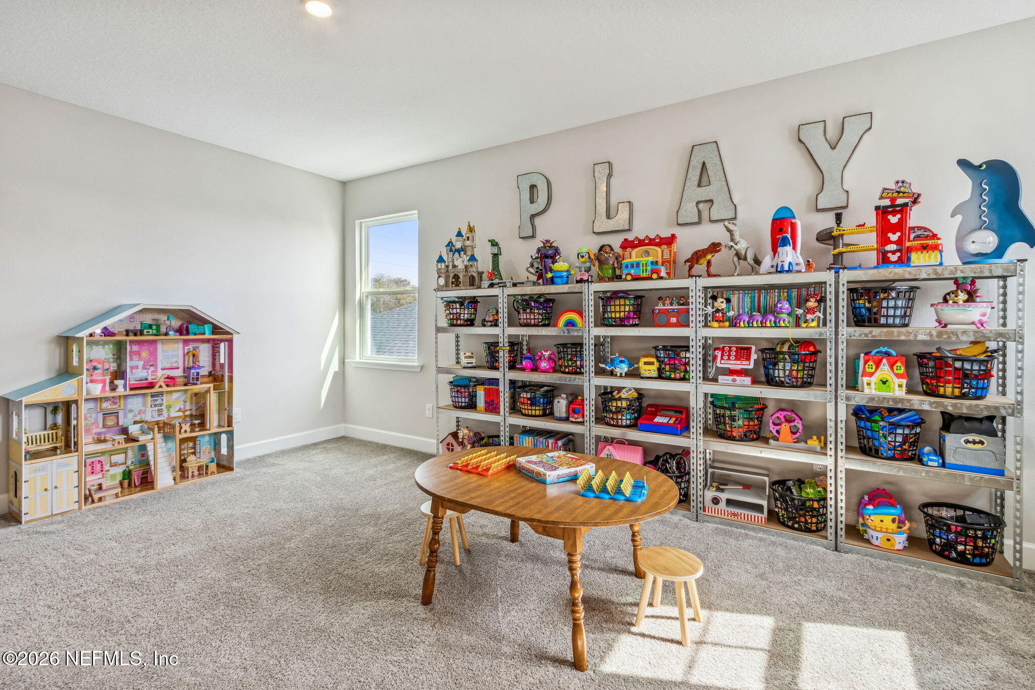 95057 Terris Way Fernandina Beach, FL 32034 - Photo 30 of 43 a room with furniture a book shelf and a book shelf