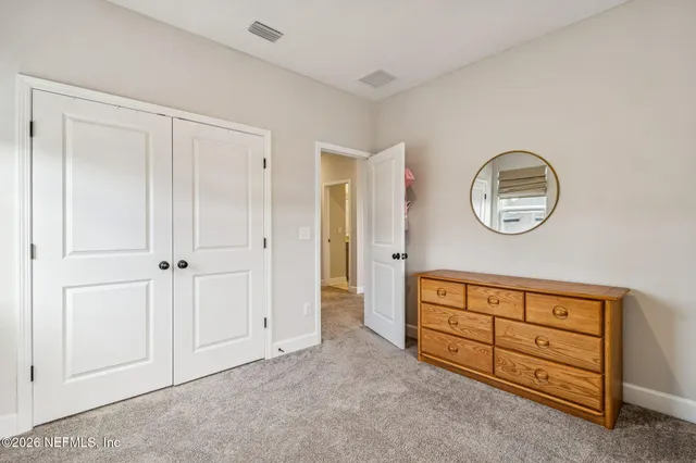 a view of a workspace with furniture