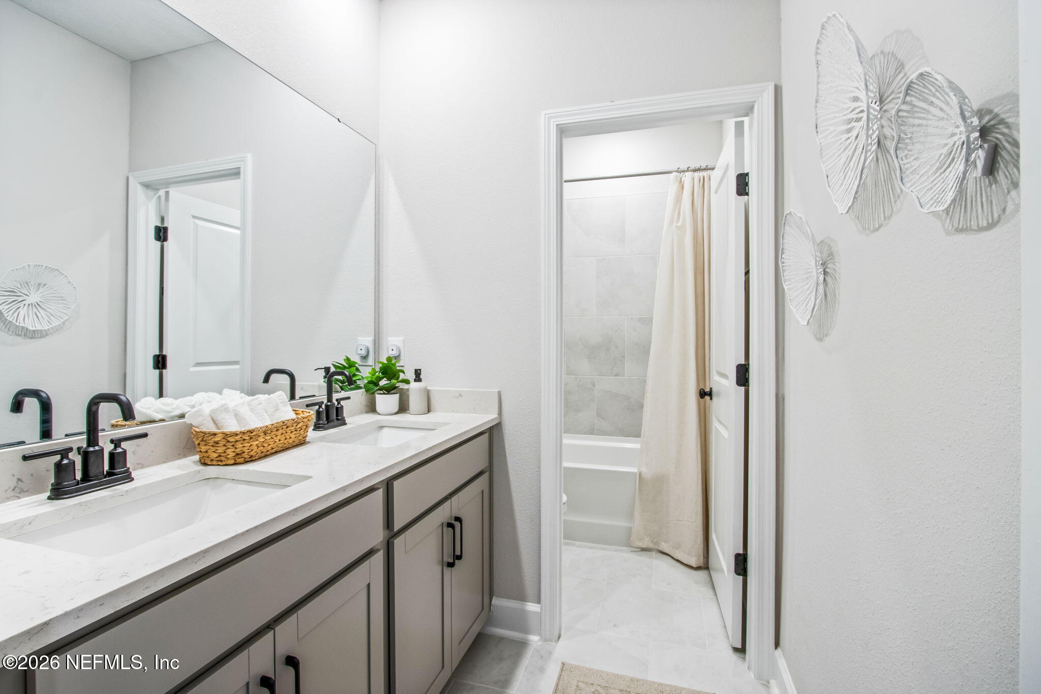 95057 Terris Way Fernandina Beach, FL 32034 - Photo 35 of 43 a bathroom with a double vanity sink and mirror