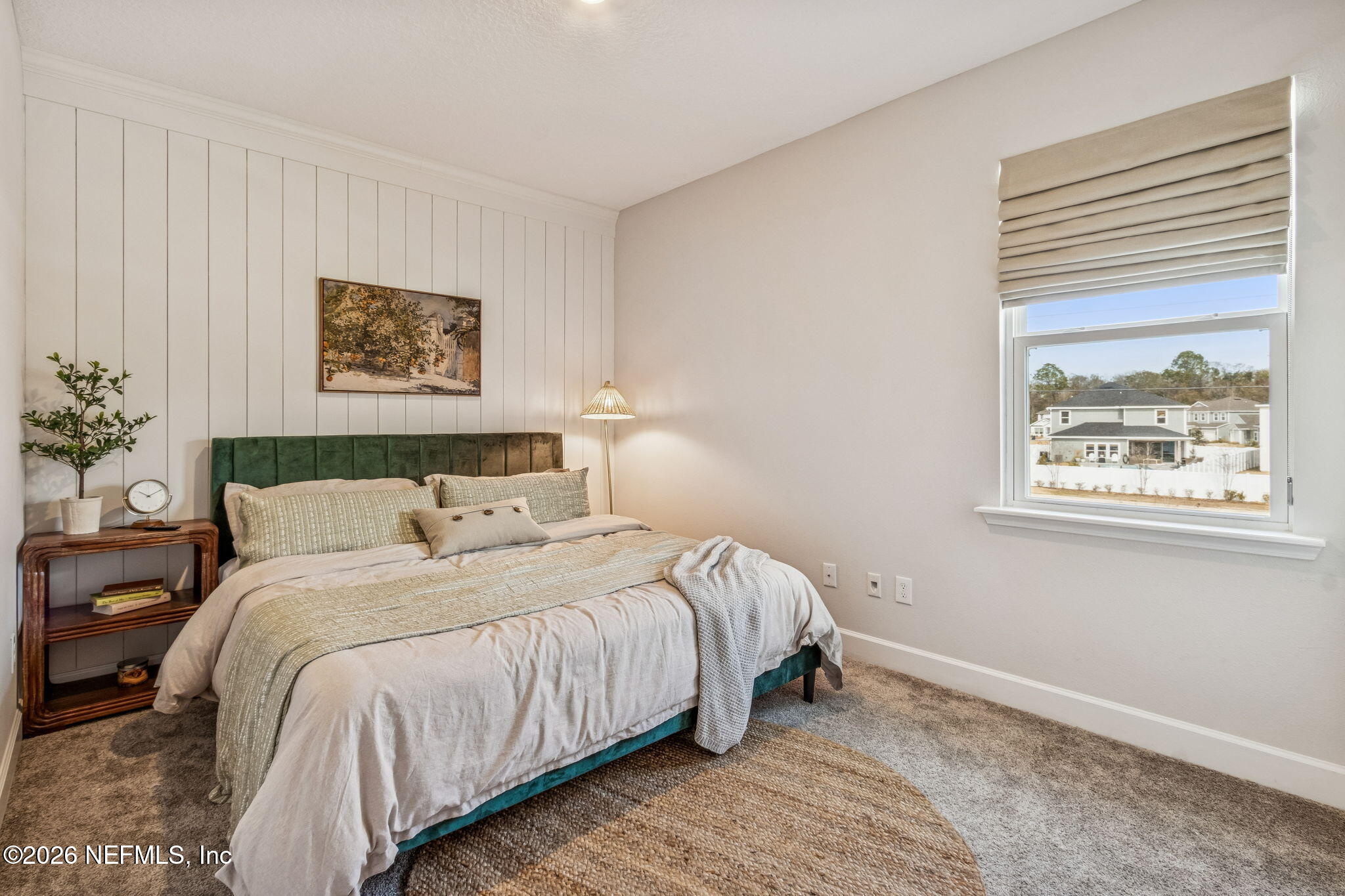 95057 Terris Way Fernandina Beach, FL 32034 - Photo 36 of 43 a bedroom with a bed and a painting on the wall