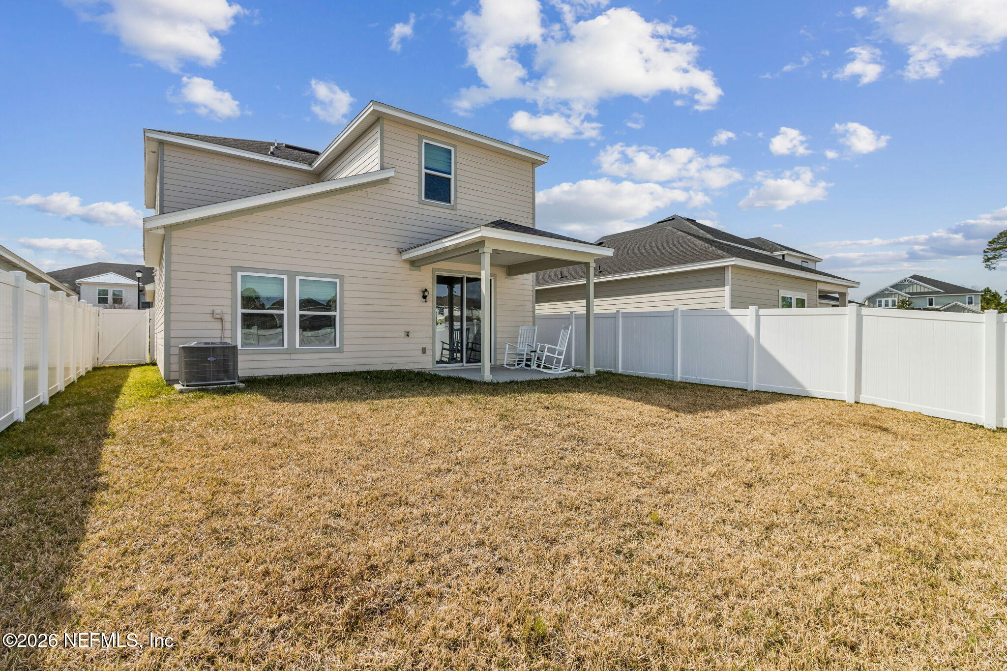 95057 Terris Way Fernandina Beach, FL 32034 - Photo 40 of 43 a view of a house with a yard