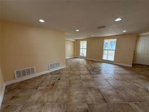 a view of a livingroom with a staircase