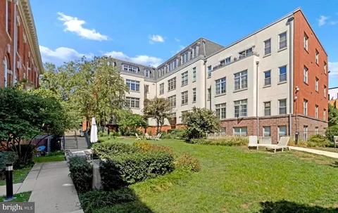 a view of a building with garden