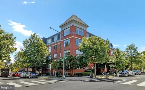 a view of a building with a street