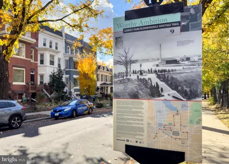 a view of a street with cars