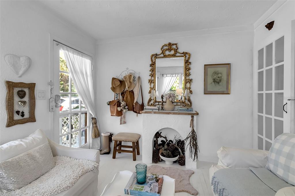 2562 Ashton Road Sarasota, FL 34231 - Photo 12 of 30 a living room with furniture and a large window
