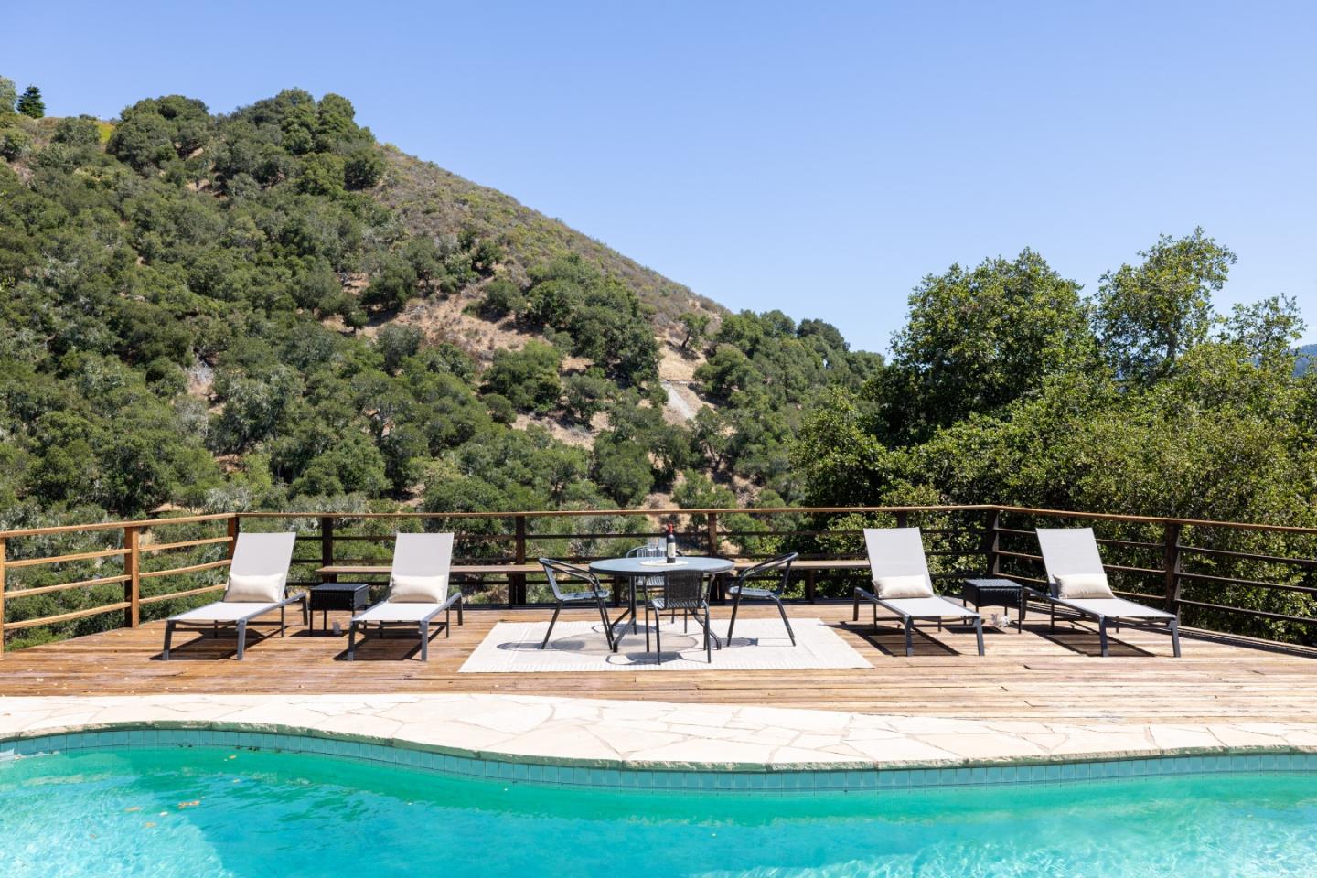 9 De Amaral Road Carmel Valley, CA 93924 - Photo 14 of 17 a view of a backyard with sitting area