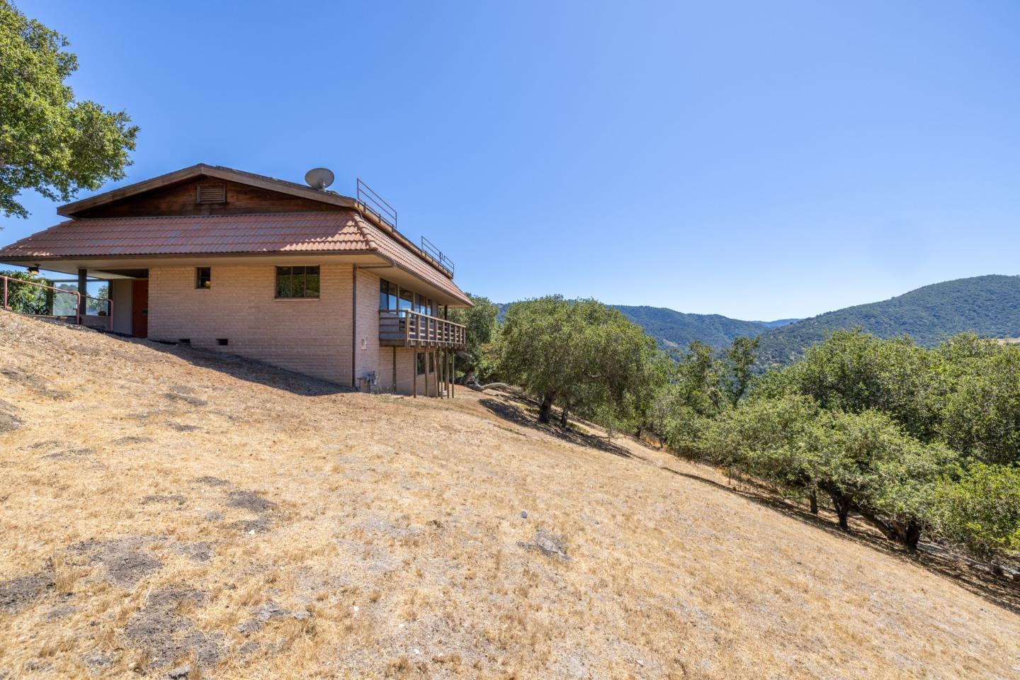 9 De Amaral Road Carmel Valley, CA 93924 - Photo 17 of 17 a view of a house with a yard