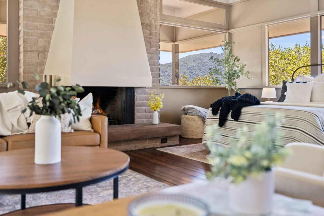 9 De Amaral Road Carmel Valley, CA 93924 - Photo 6 of 17 a living room with furniture and a large window