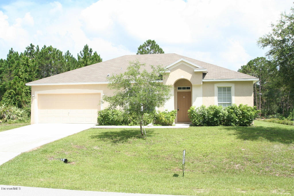 1421 Hanscom Road Southwest Palm Bay, FL 32908 - Photo 1 of 8 Exterior Front
