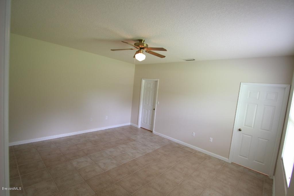 1421 Hanscom Road Southwest Palm Bay, FL 32908 - Photo 5 of 8 Master Bedroom