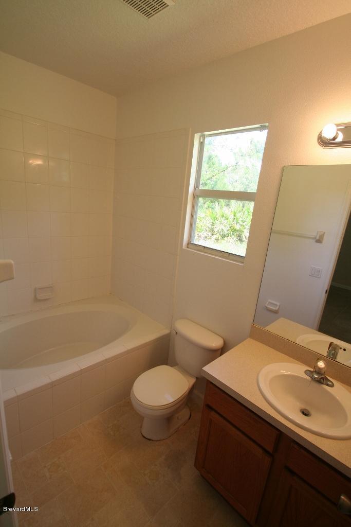 1421 Hanscom Road Southwest Palm Bay, FL 32908 - Photo 6 of 8 Master Bath