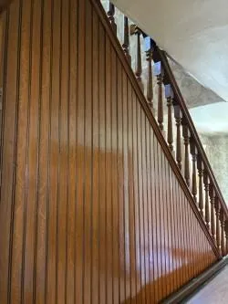 a view of living room with furniture and a fireplace