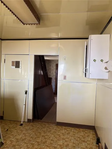 a view of hallway with stairs