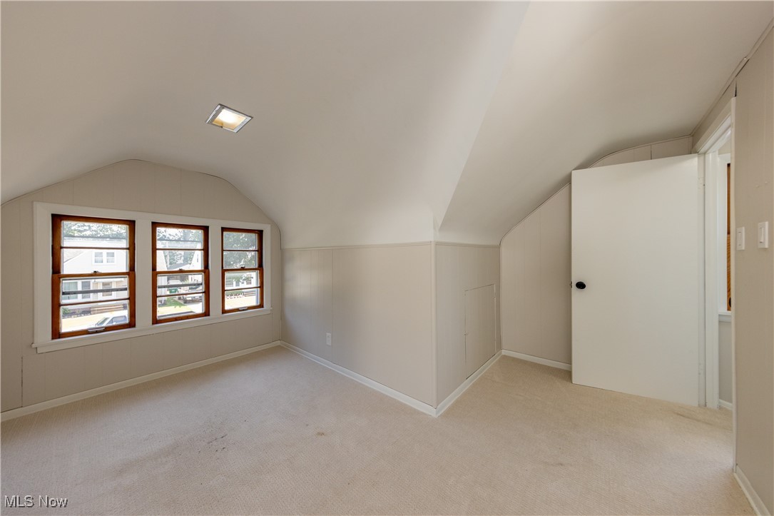 29103 Barjode Road Eastlake, OH 44095 - Photo 20 of 31 Bonus room with light carpet and lofted ceiling