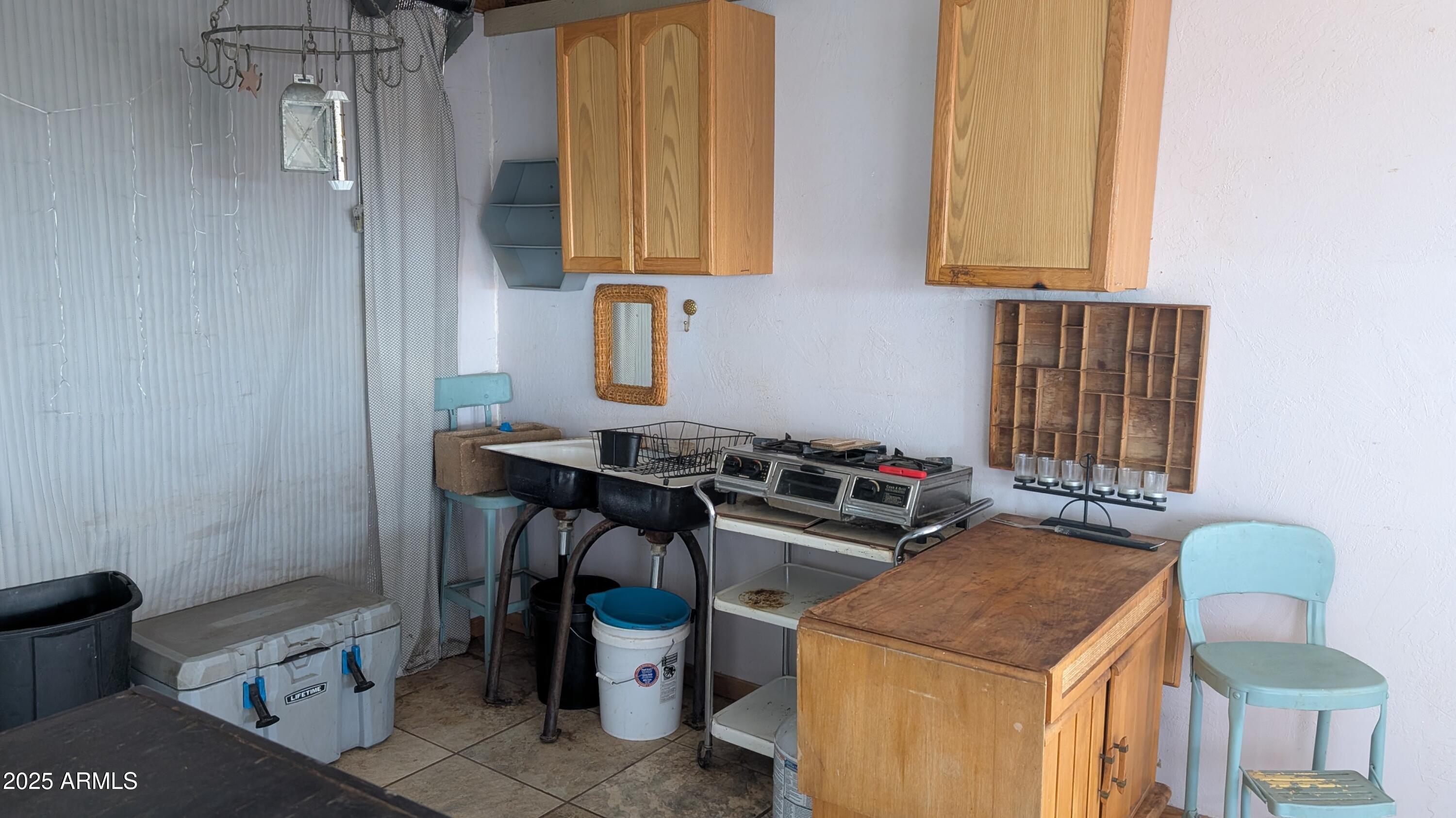 Tbd North Westward Trail, Unit 9 McNeal, AZ 85617 - Photo 28 of 37 a room that has a sink and a chair in it