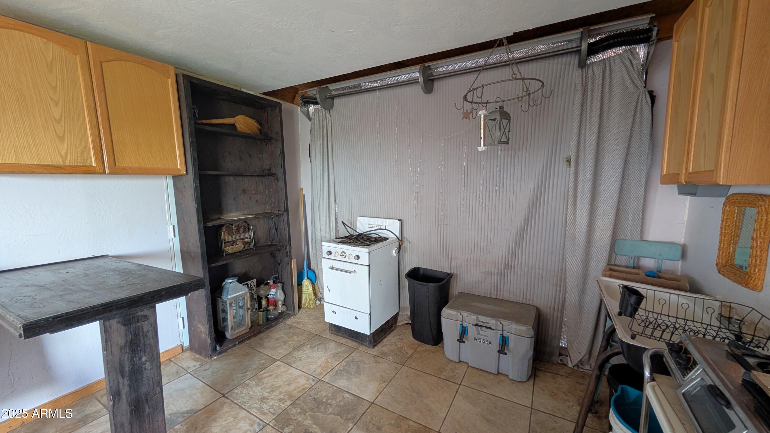 Tbd North Westward Trail, Unit 9 McNeal, AZ 85617 - Photo 29 of 37 a view of walk in closet with clothes and shoes