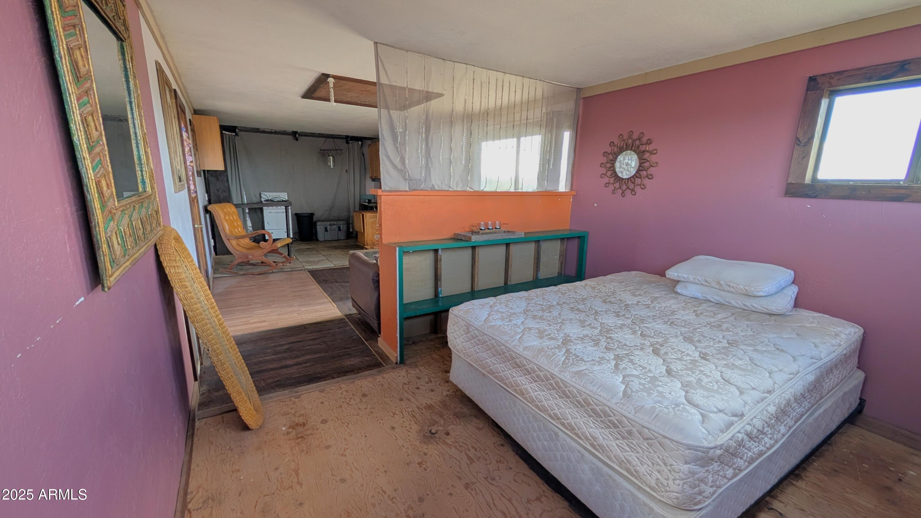 Tbd North Westward Trail, Unit 9 McNeal, AZ 85617 - Photo 33 of 37 a bedroom with a bed and a mirror