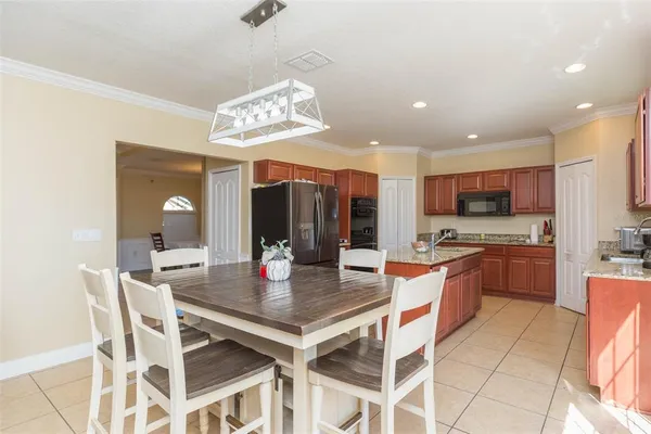 a view of a dining room kitchen and a window