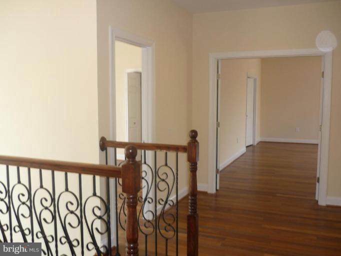 5224 Inverchapel Road Springfield, VA 22151 - Photo 18 of 30 a view of an entryway with wooden floor