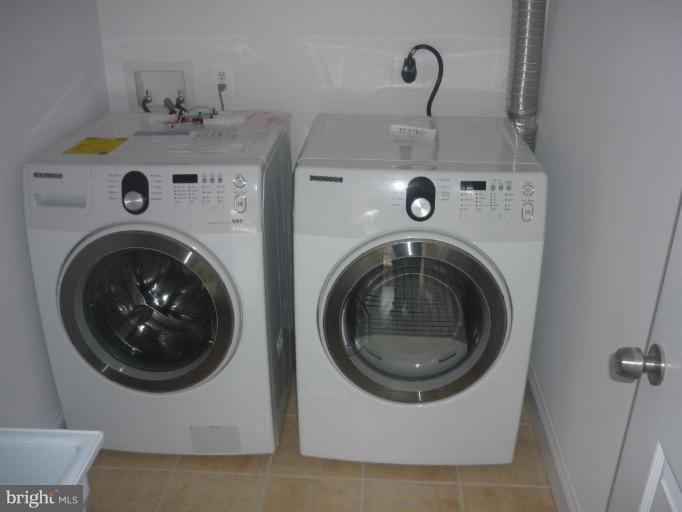 5224 Inverchapel Road Springfield, VA 22151 - Photo 30 of 30 a utility room with dryer and washer