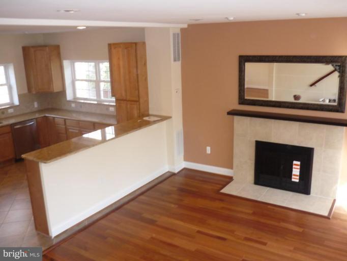 5224 Inverchapel Road Springfield, VA 22151 - Photo 6 of 30 a view of an empty room and a fireplace