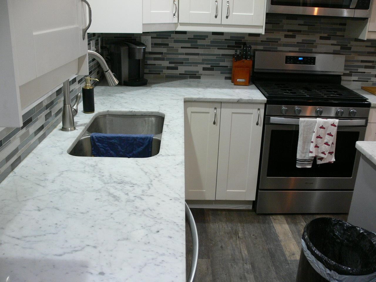 4223 Ostrander Road Rockford, IL 61107 - Photo 20 of 20 a kitchen with a stove and cabinets