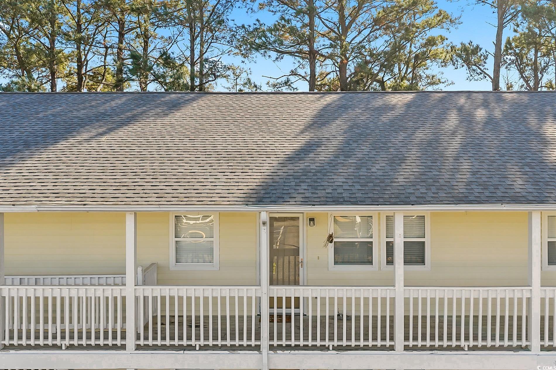 4150 Horseshoe Road North, Unit 38 Little River, SC 29566 - Photo 2 of 29 View of front of house with roof with shingles