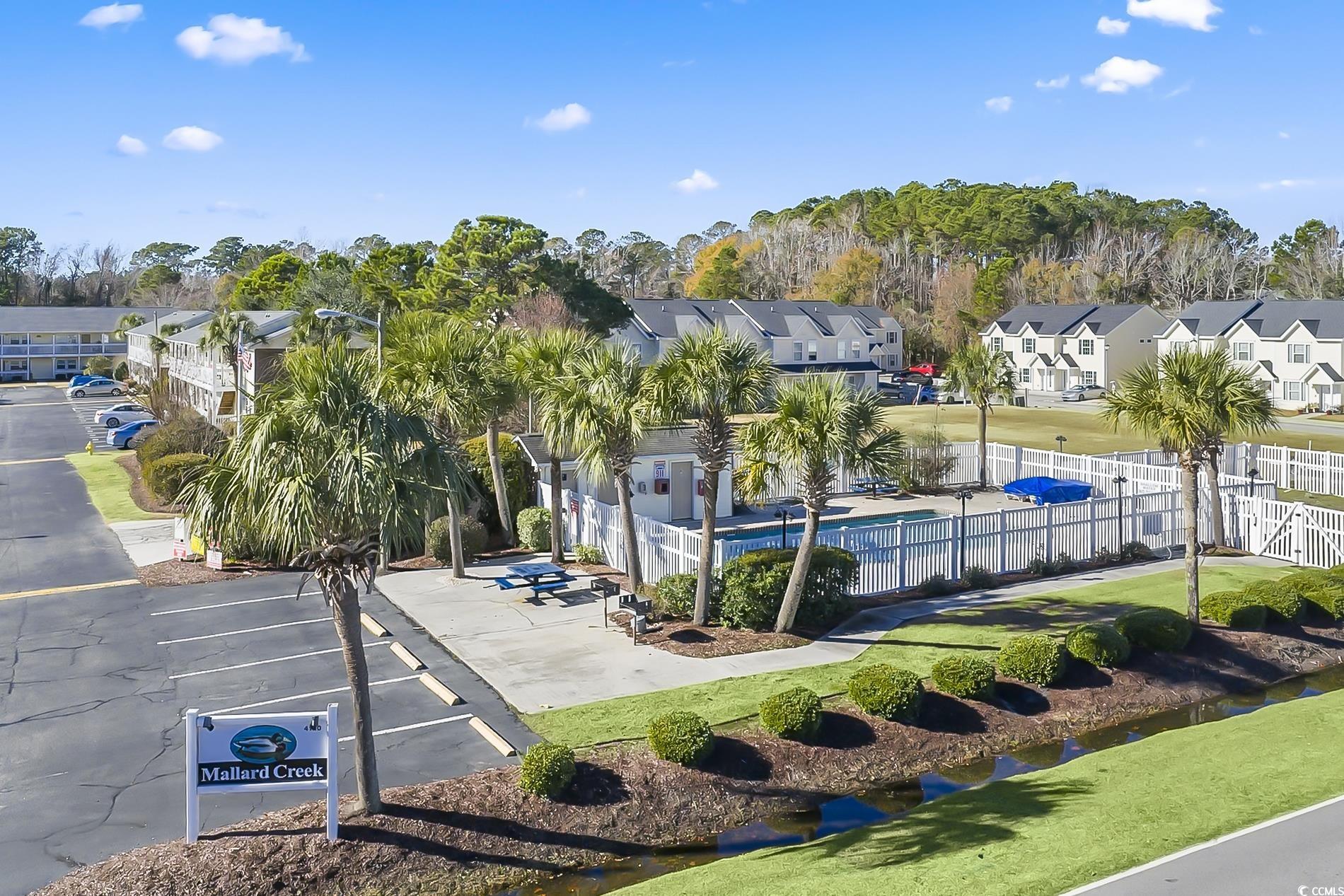 4150 Horseshoe Road North, Unit 38 Little River, SC 29566 - Photo 24 of 29 View of home's community featuring a residential view and view of scattered trees