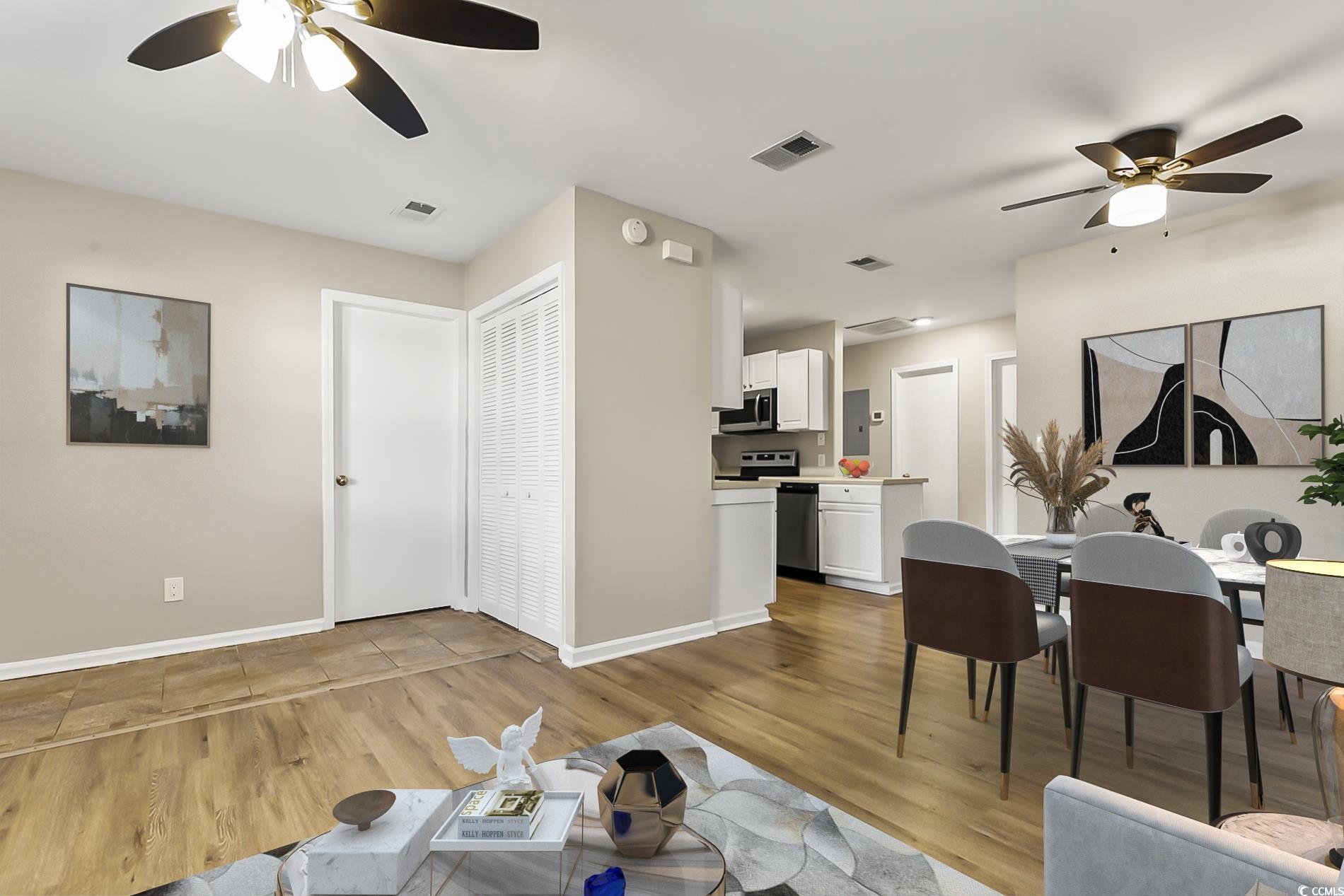 4150 Horseshoe Road North, Unit 38 Little River, SC 29566 - Photo 6 of 29 Living area featuring ceiling fan and light wood-type flooring