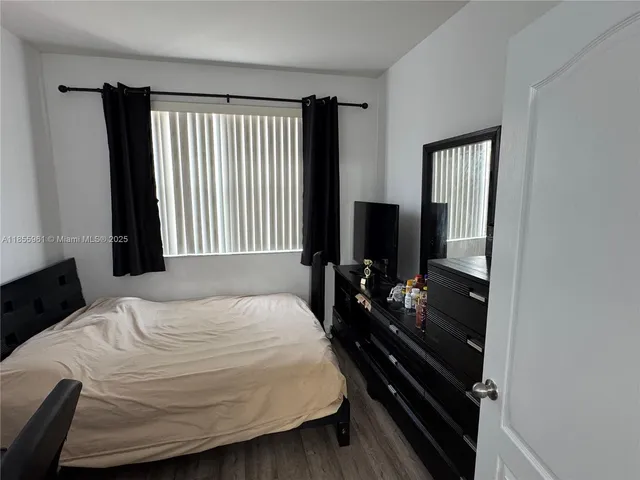 a view of livingroom with furniture and wooden floor
