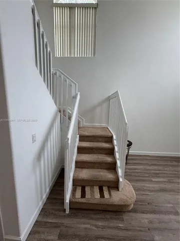 a utility room with a sink dryer and washer