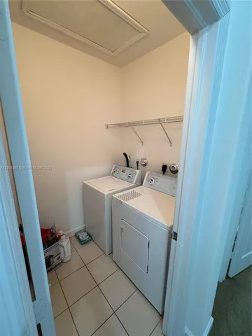 a view of an entryway with a workspace