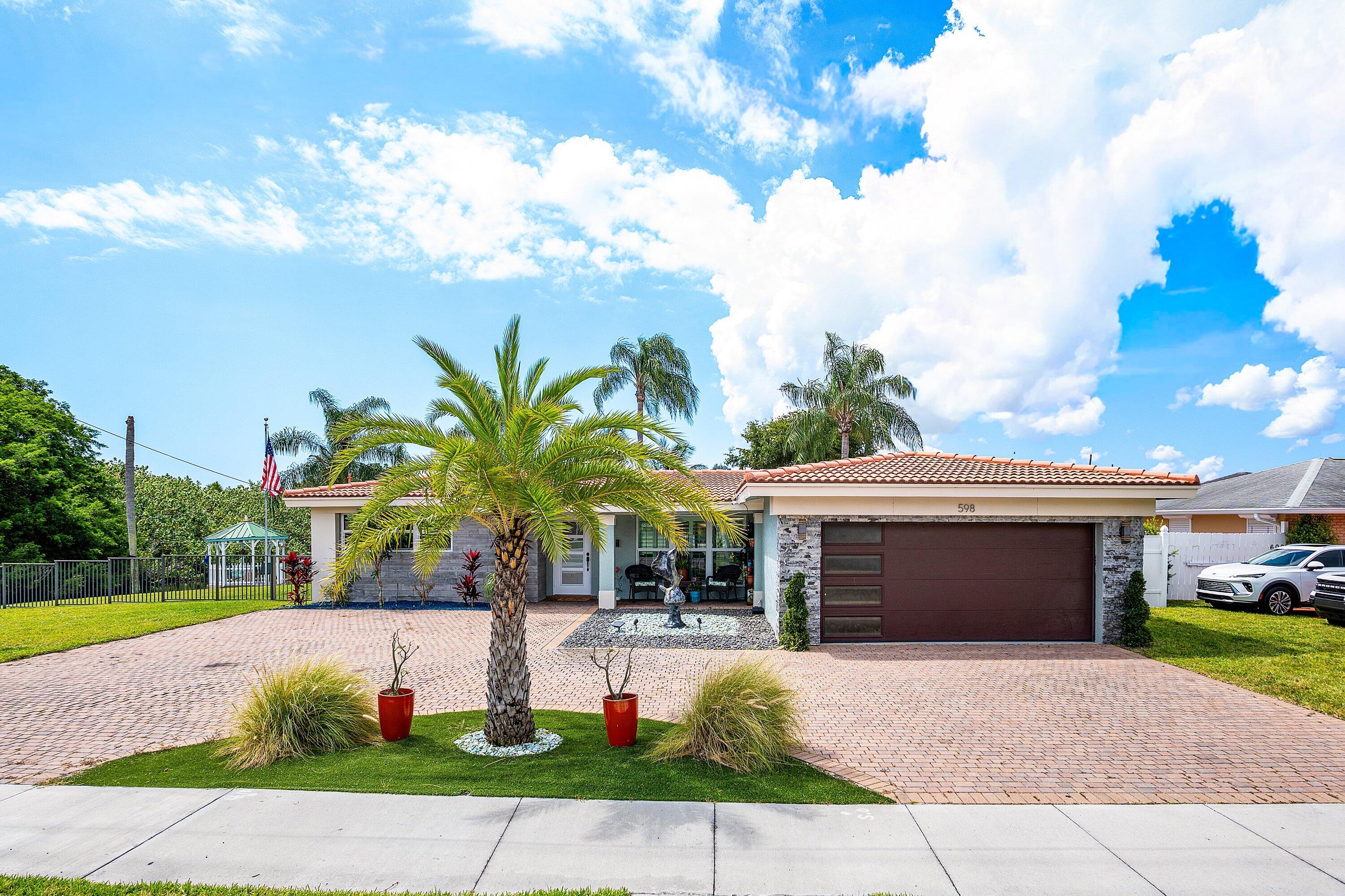598 West Palmetto Park Road Boca Raton, FL 33486 - Photo 2 of 46 001-598WestPalmettoParkRoad-BocaRaton-FL