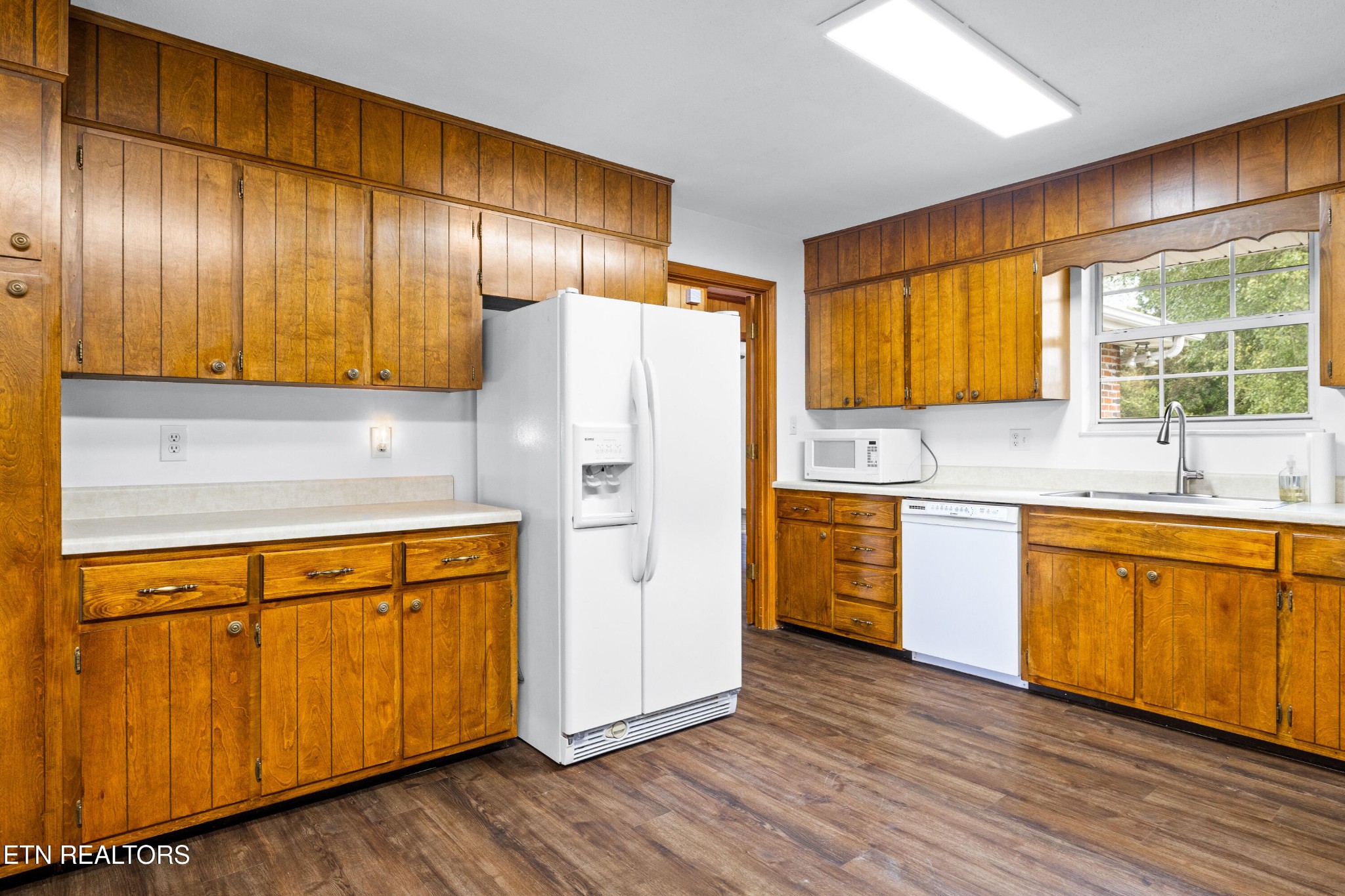 804 Chilhowee View Road Maryville, TN 37803 - Photo 11 of 38 a kitchen with stainless steel appliances a refrigerator sink and cabinets