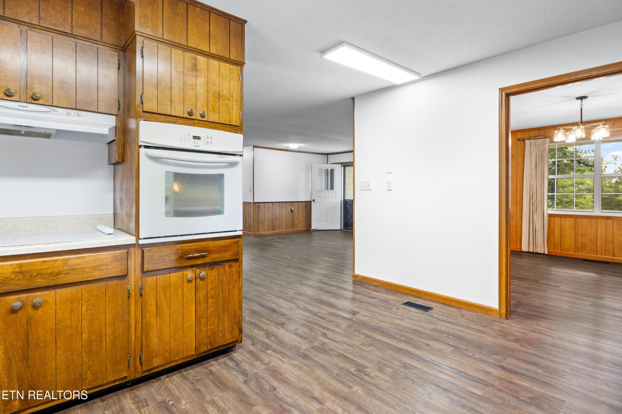 804 Chilhowee View Road Maryville, TN 37803 - Photo 13 of 38 a view of a kitchen with wooden floor and electronic appliances