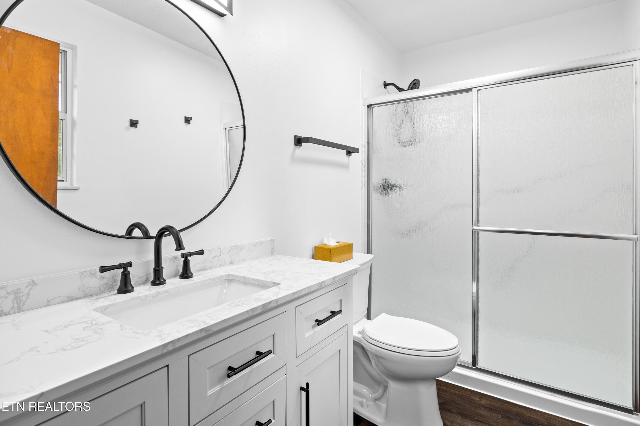 804 Chilhowee View Road Maryville, TN 37803 - Photo 16 of 38 a bathroom with a sink a toilet and a mirror