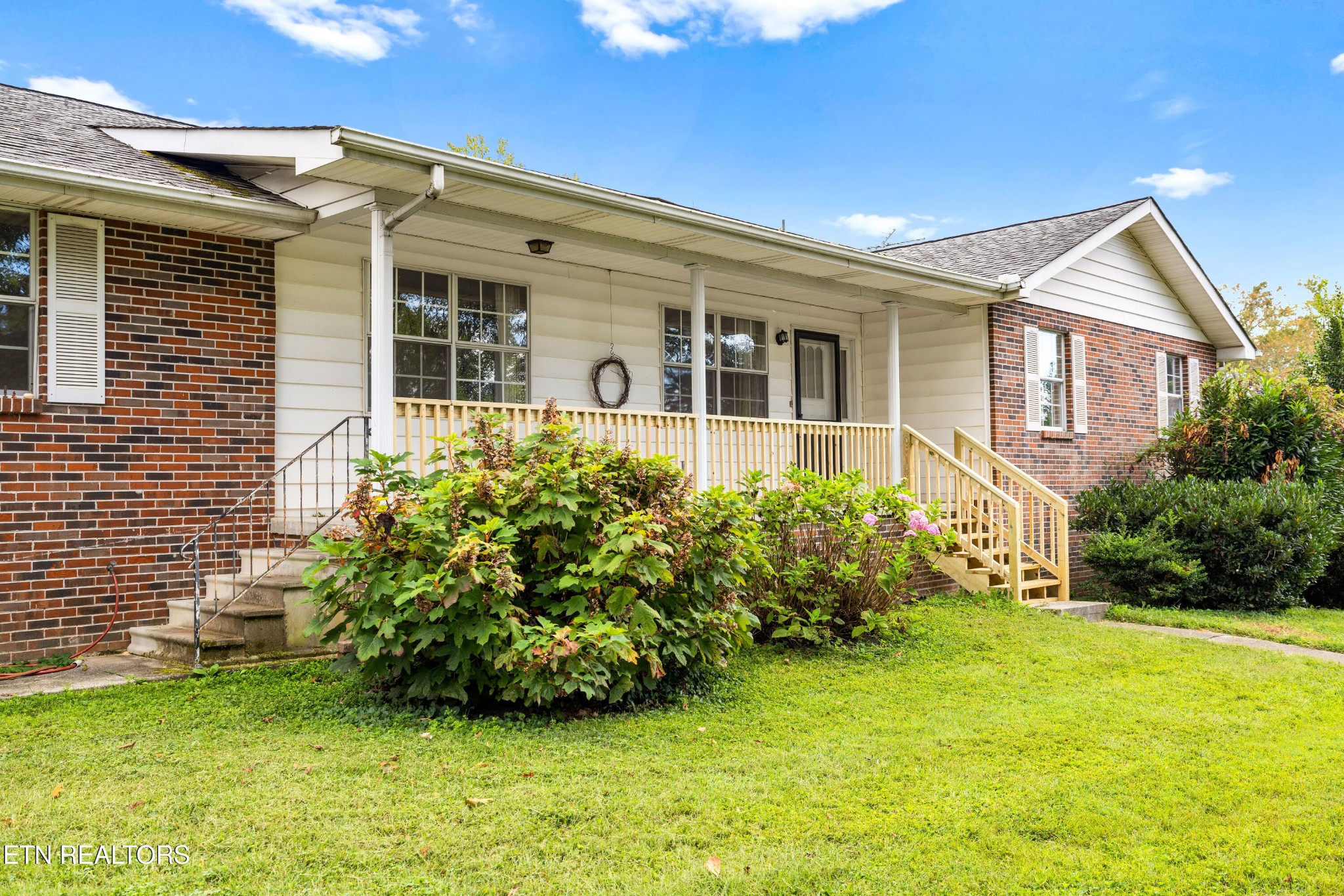 804 Chilhowee View Road Maryville, TN 37803 - Photo 2 of 38 a front view of a house with garden