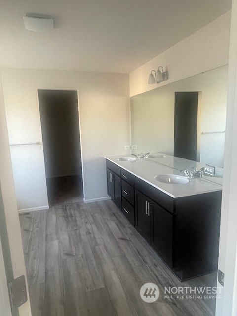 2818 Laurel Loop Milton, WA 98354 - Photo 5 of 7 a bathroom with a sink and a mirror