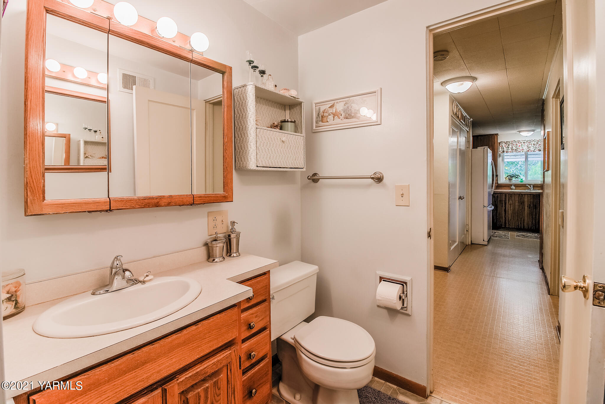 681 Lateral A Road Wapato, WA 98951 - Photo 12 of 19 a bathroom with a granite countertop sink toilet and shower