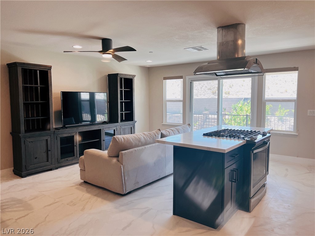 4631 Amazing View Street Las Vegas, NV 89129 - Photo 30 of 33 An open-concept living space with sleek flooring and natural light.