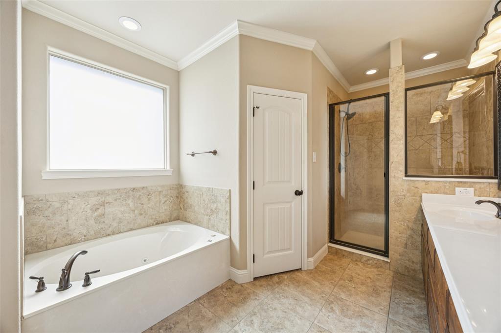 370 Private Road 5291 Yantis, TX 75497 - Photo 17 of 40 a bathroom with a bathtub and a shower