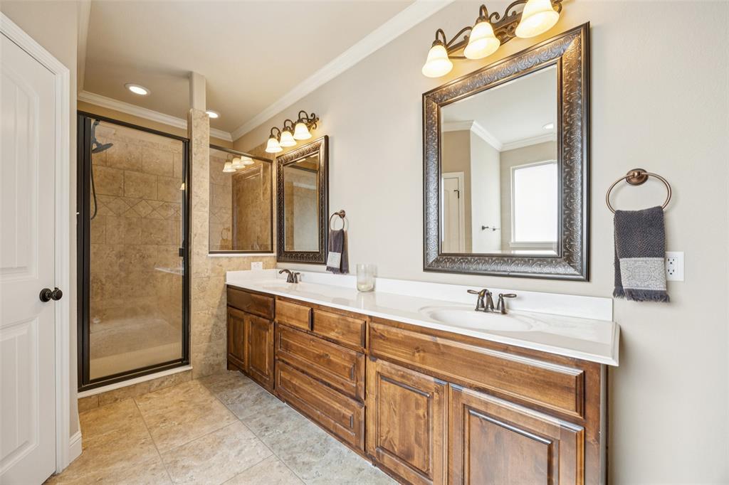 370 Private Road 5291 Yantis, TX 75497 - Photo 18 of 40 a bathroom with a double vanity sink mirror and
