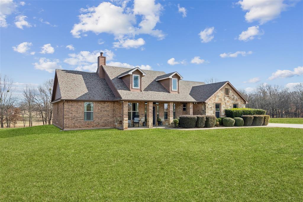 370 Private Road 5291 Yantis, TX 75497 - Photo 27 of 40 a view of a house with a big yard and large trees