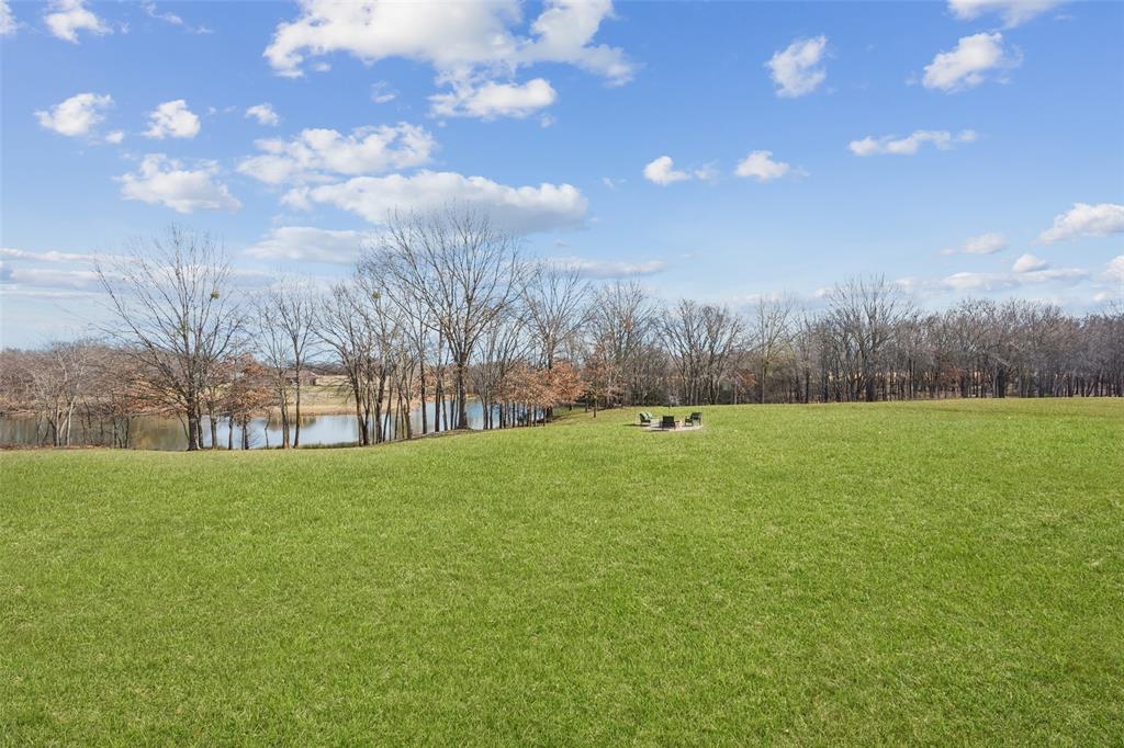 370 Private Road 5291 Yantis, TX 75497 - Photo 30 of 40 a view of outdoor space with green field and trees
