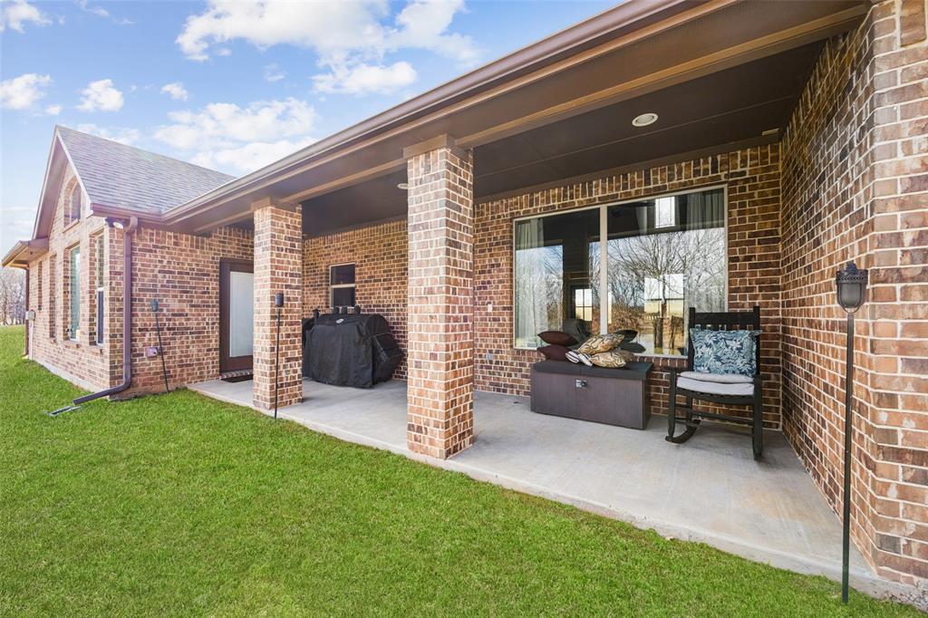 370 Private Road 5291 Yantis, TX 75497 - Photo 34 of 40 a view of a porch with furniture and a yard