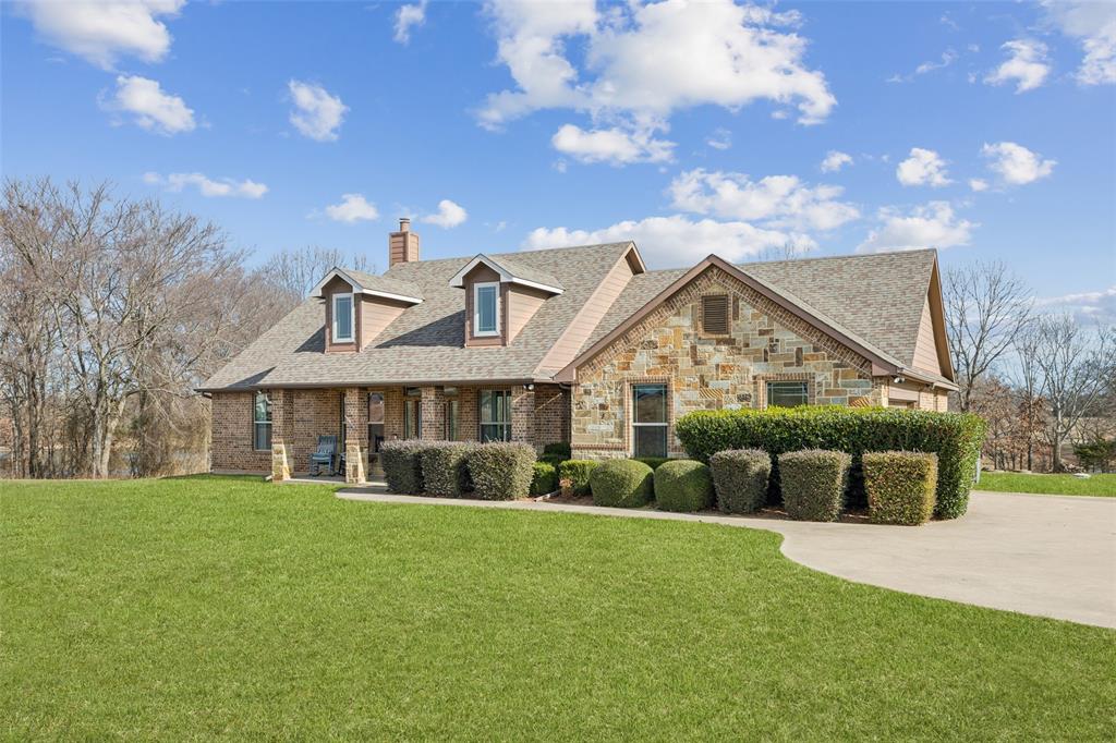 370 Private Road 5291 Yantis, TX 75497 - Photo 38 of 40 a front view of house with yard and green space