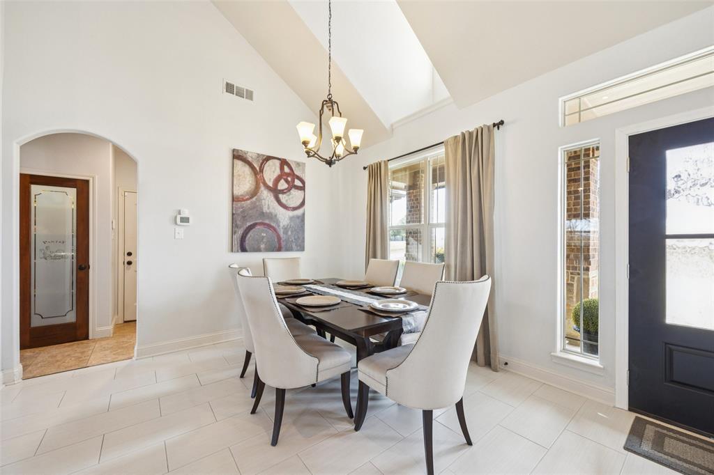 370 Private Road 5291 Yantis, TX 75497 - Photo 5 of 40 a view of a dining room with furniture and a chandelier