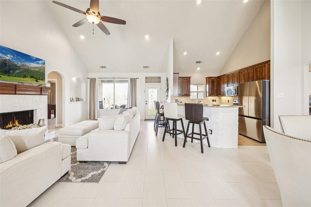 370 Private Road 5291 Yantis, TX 75497 - Photo 7 of 40 a living room with furniture and a fireplace
