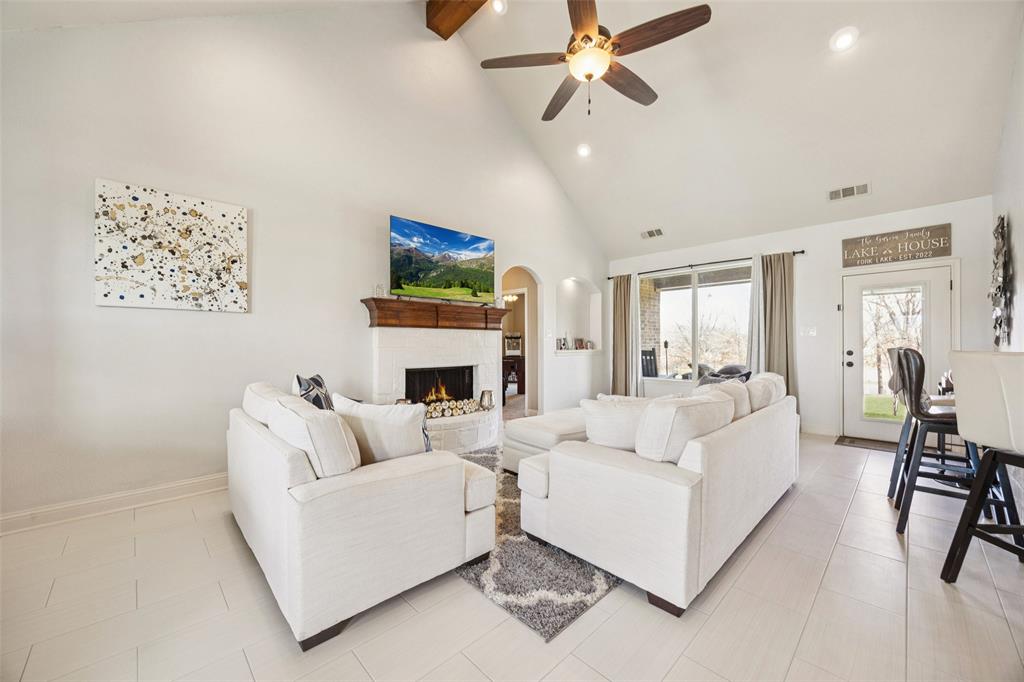 370 Private Road 5291 Yantis, TX 75497 - Photo 9 of 40 a living room with furniture and a fireplace